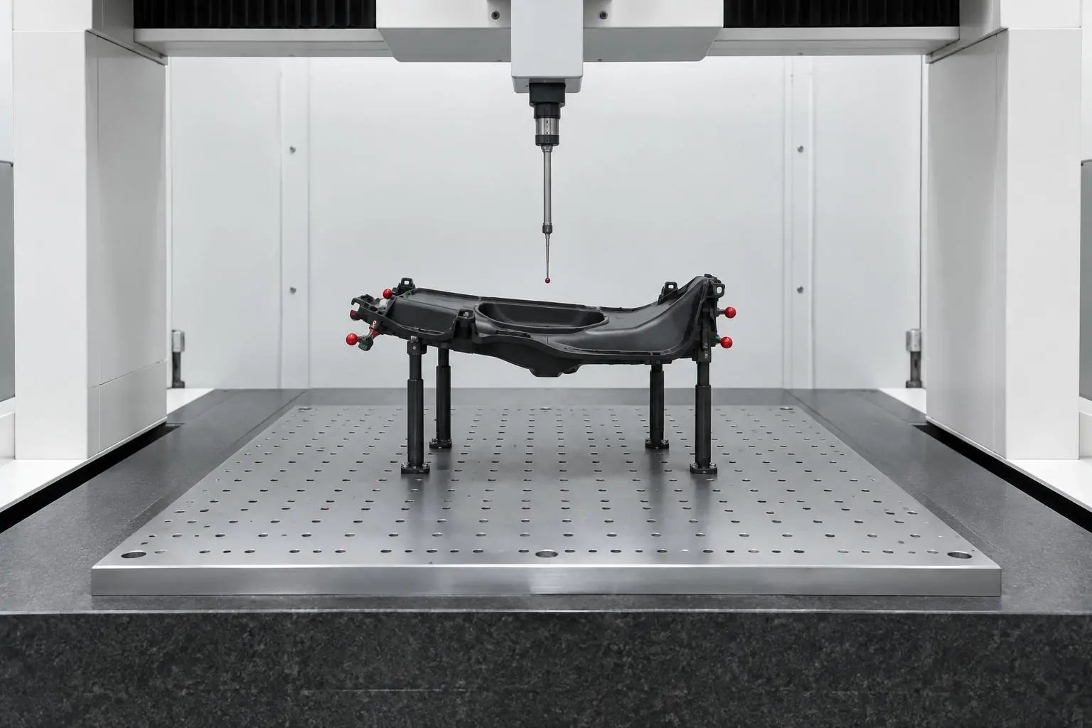 Coordinate measuring machine inspecting a fixtured component
